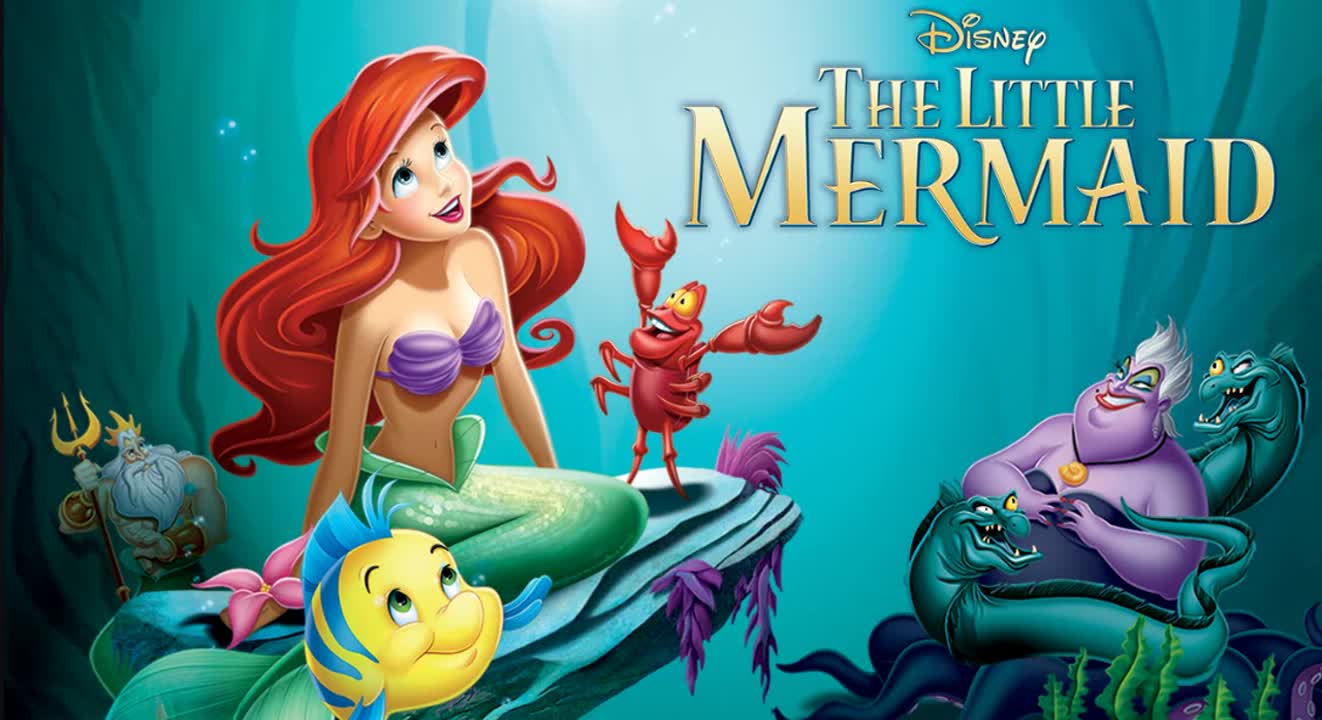 A mermaid named Ariel is surrounded by her friends: a Sebastian the crab and  a fish named Flounder