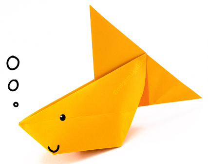 Orange origami fish with hand-drawn air bubbles