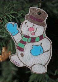 Waving snowman made with shrink plastic