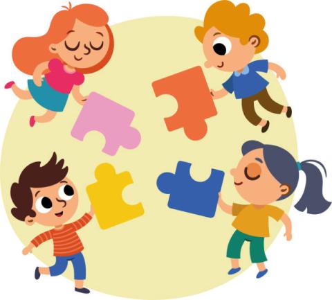 4 children each holding a puzzle piece