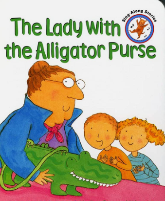 A Lady who has a purse that looks like an alligator is with two children